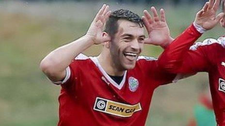 Cliftonville celebrate after one of their three goals at Solitude