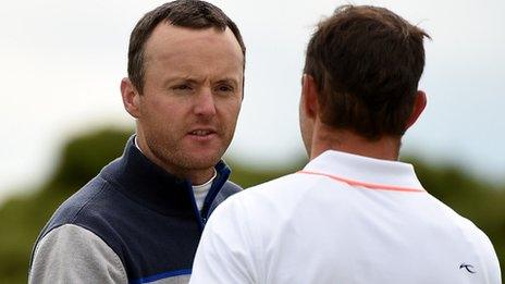 Michael Hoey shakes hands with Maximillan Kieffer after Thursday's victory