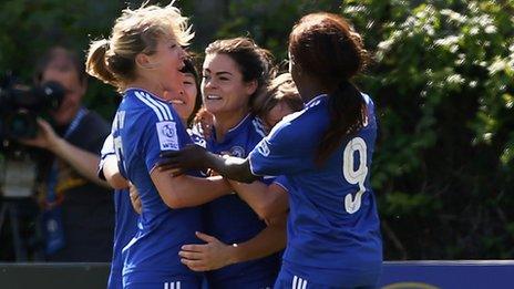 Claire Rafferty (centre) celebrates her goal with Chelsea teammates