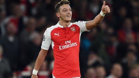 Mesut Ozil celebrates