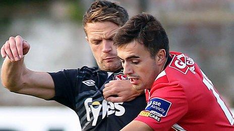 Dane Massey of Dundalk in action against Derry City's Mark Timlin