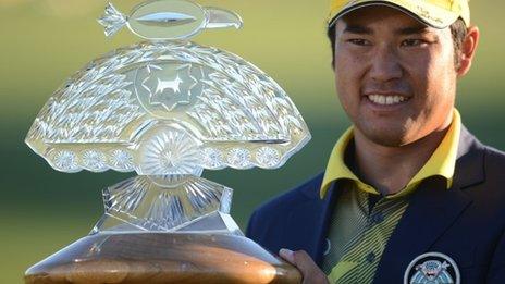 Hideki Matsuyama with Phoenix Open trophy