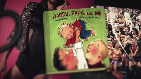 A still showing a book about same-sex parenting