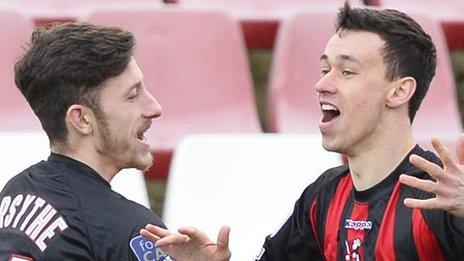 Jordan Forsythe congratulates Crusaders scorer Paul Heatley