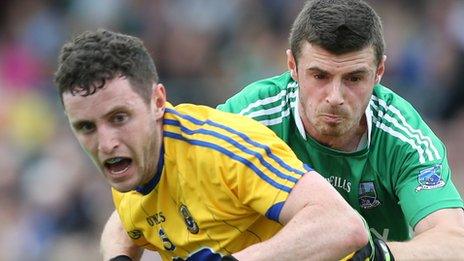 Ciaran Murtagh of Roscommon in action against Fermanagh's Mickey Jones