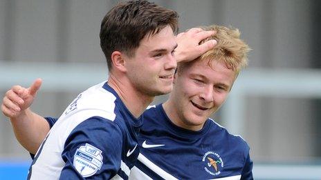 Michael McCrudden congratulates Ballinamallard scorer John Currie