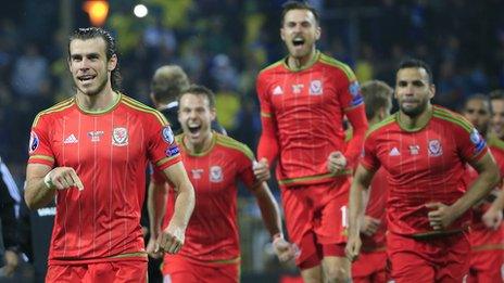 Gareth Bale and Wales team-mates celebrate Euro 2016 qualification