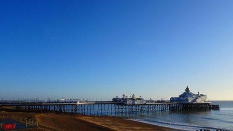 Clear blue sky over Eastbourne pier