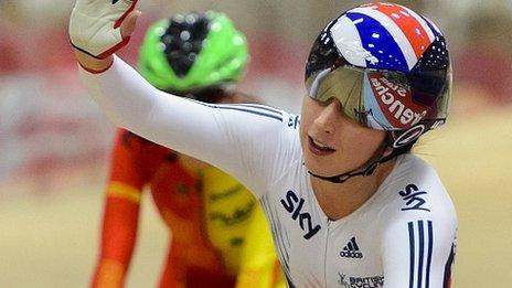 Britain's Laura Trott celebrates winning the women's scratch race