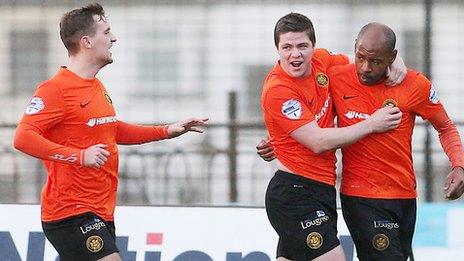 Miguel Chines (right) celebrates scoring against Ballymena