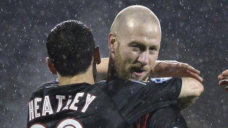 Paul Heatley congratulates Crusaders scorer Stephen O'Flynn