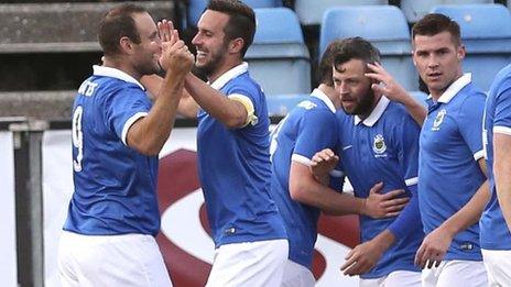 Guy Bates (left) celebrates his goal in Totfir