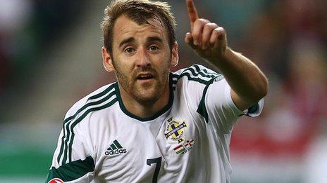 Niall McGinn celebrates scoring against Hungary