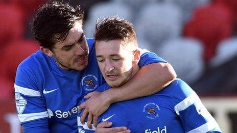 Liam Martin is congratulated after scoring Ballinamallard's first goal