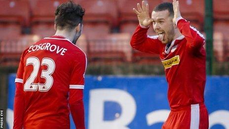 Martin Donnelly celebrates scoring against Dungannon at Solitude