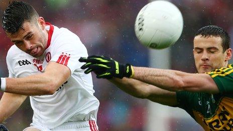 Darren McCurry of Tyrone in action against Kerry's Shane Enright