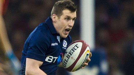 Scotland centre Mark Bennett takes on the Wales defence