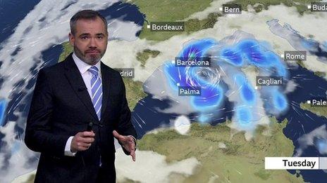 Ben Rich stands in front of a weather chart showing Storm Juliette building in the Mediterranean