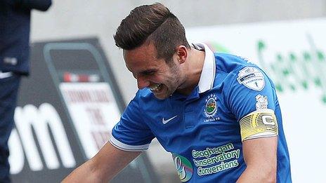 Andrew Waterworth celebrates after scoring for Linfield