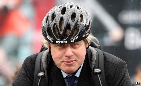 Boris Johnson in a cycling helmet