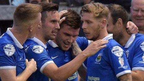 Stephen Lowry celebrates with Linfield team-mates