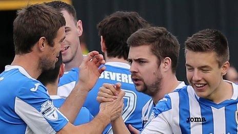 Coleraine celebrated a 2-1 win away to Carrick Rangers