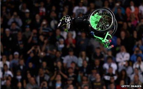 Aaron Fotheringham performs a stunt in his wheelchair during Nitro Circus Live at Westpac Stadium on February 9, 2013 in Wellington, New Zealand