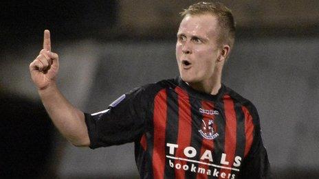 Jordan Owens celebrates scoring against Coleraine to equal the club scoring record