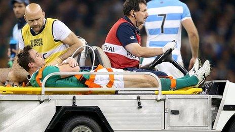 Tommy Bowe is taken from the field after sustaining the knee injury