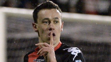 Paul Heatley celebrates after firing Crusaders into a 2-1 lead against Ballinamallard with a stunning volley