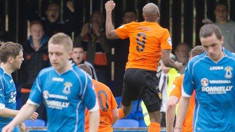 Carrick's Miguel Chines celebrates scoring against Dungannon at Stangmore Park last August