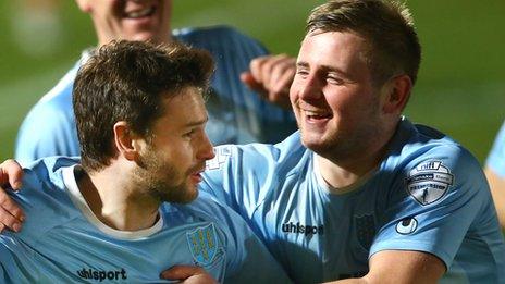 Ballymena's Nathan Hanley celebrates with team-mate David Cushley