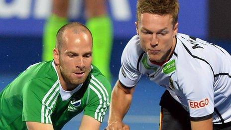 Ireland's Peter Caruth competes against Mathias Muller of Germany