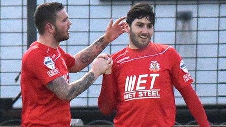 Darren Murray congratulates Portadown goalscorer Sean Mackle