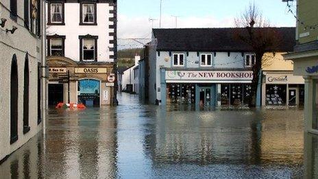 Flooded streets in Cockermouth, Cumbria after heavy rain from Storm Desmond.