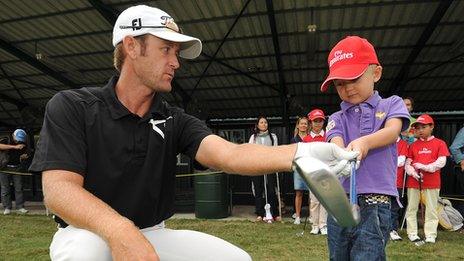 Child playing golf