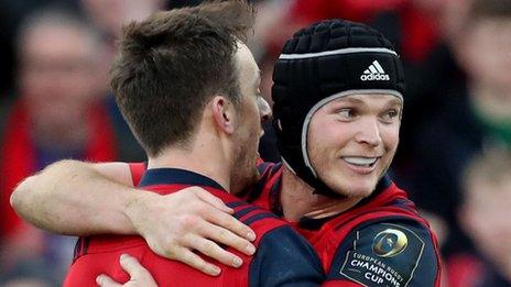 Tyler Bleyendaal congratulates Darren Sweetnam who scored a late Munster try against Toulouse