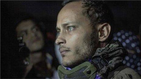 his file photo taken on July 13, 2017 shows Venezuelan police officer Oscar Perez participating in an anti-government protest in Caracas on July 13, 2017.