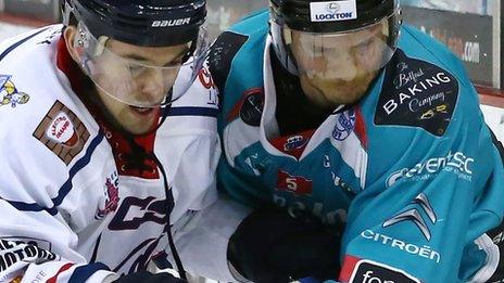 Kris Beech of the Belfast Giants in action against Dundee's Kevin Hart