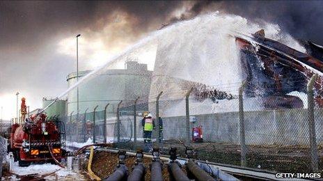 Firefighters try to put out the Buncefield fire