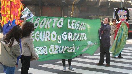 Argentine feminists stop traffic outside the Congress building in Buenos Aires