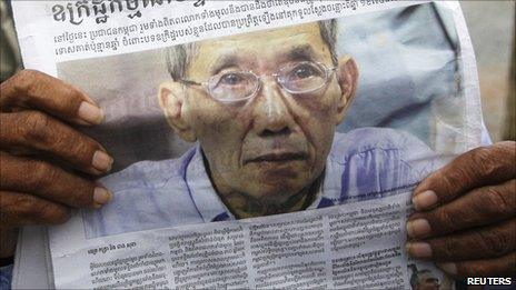 Newspaper showing a picture of jailed ex-prison chief Duch