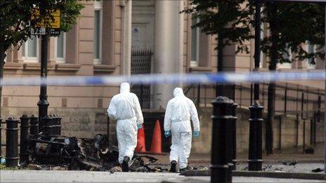 Forensic scientists at bomb scene