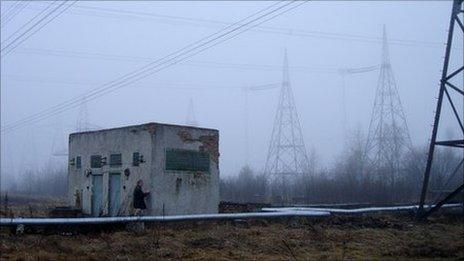 Scientist collecting bacteria samples in Chernobyl