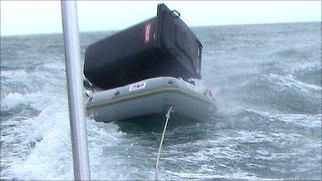 Wheelie bin being towed