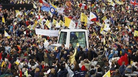 Popemobile in crowds at Cofton Park