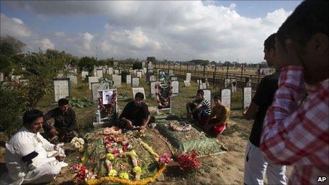 Kashmiris mourn at Martyrs' Graveyard in Srinagar.