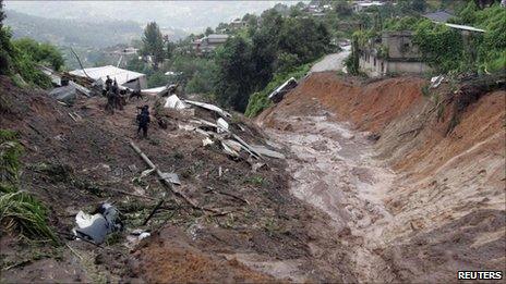 Rescuers at the scene of the landslide in Santa Maria Tlahitoltepec