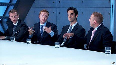 The boys team in the boardroom