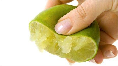 Lime being squeezed